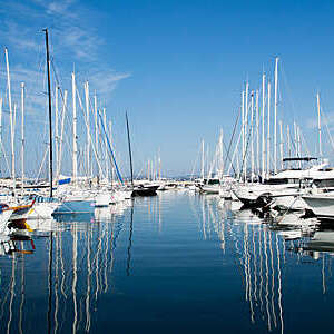 Harbor with yachts and sailboats in Saint Tropez, France.