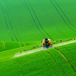 Tractor spraying chemicals